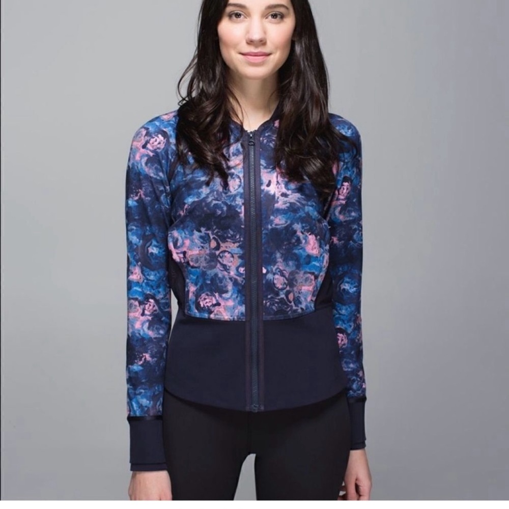 Lululemon Women's Floral Print Jacket with vented  back with front pockets.